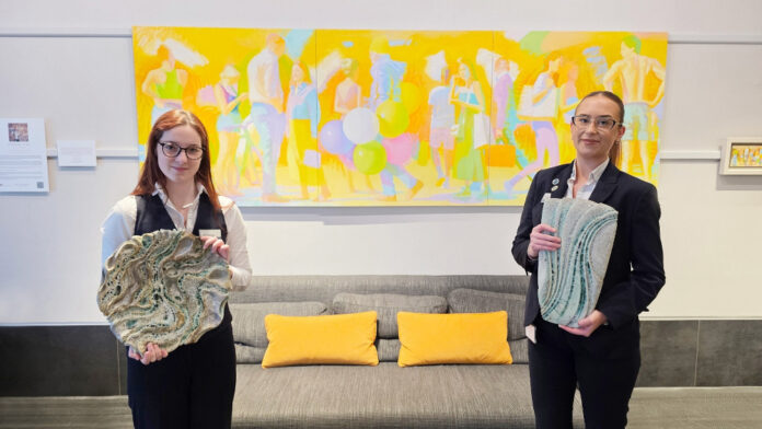 L-R-Amelia-Mitchell-Hunter-and-Ella-Murphy-showcase-the-works-of-Norman-Long-and-Wendy-Lawrence-3