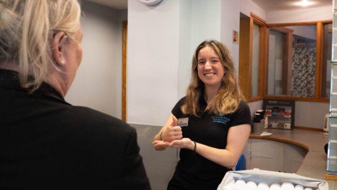 Lidia-Sells-from-Lancaster-House-Hotel-practices-her-British-Sign-Language-2